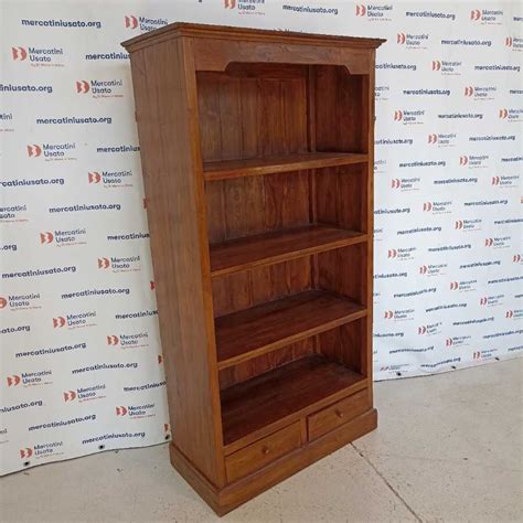 Decorazione libreria in legno massello
